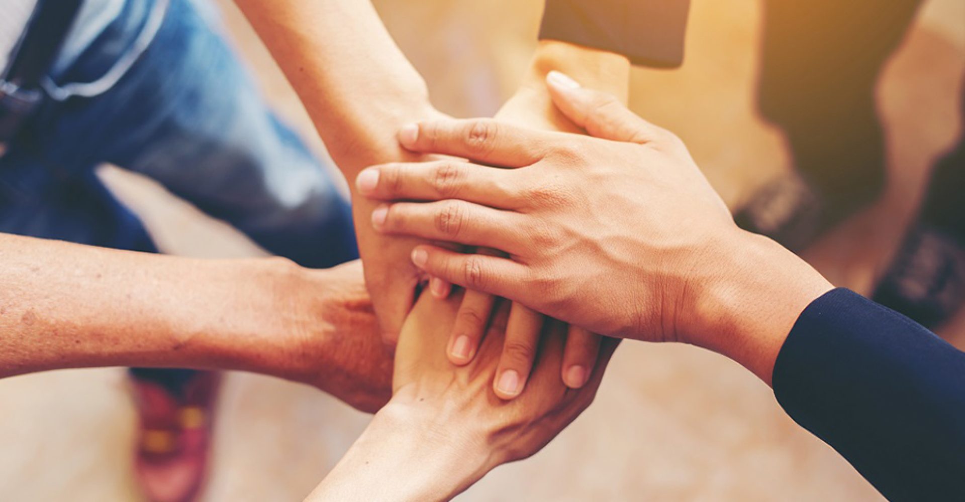 Concept of teamwork: Close-Up of hands business team showing un