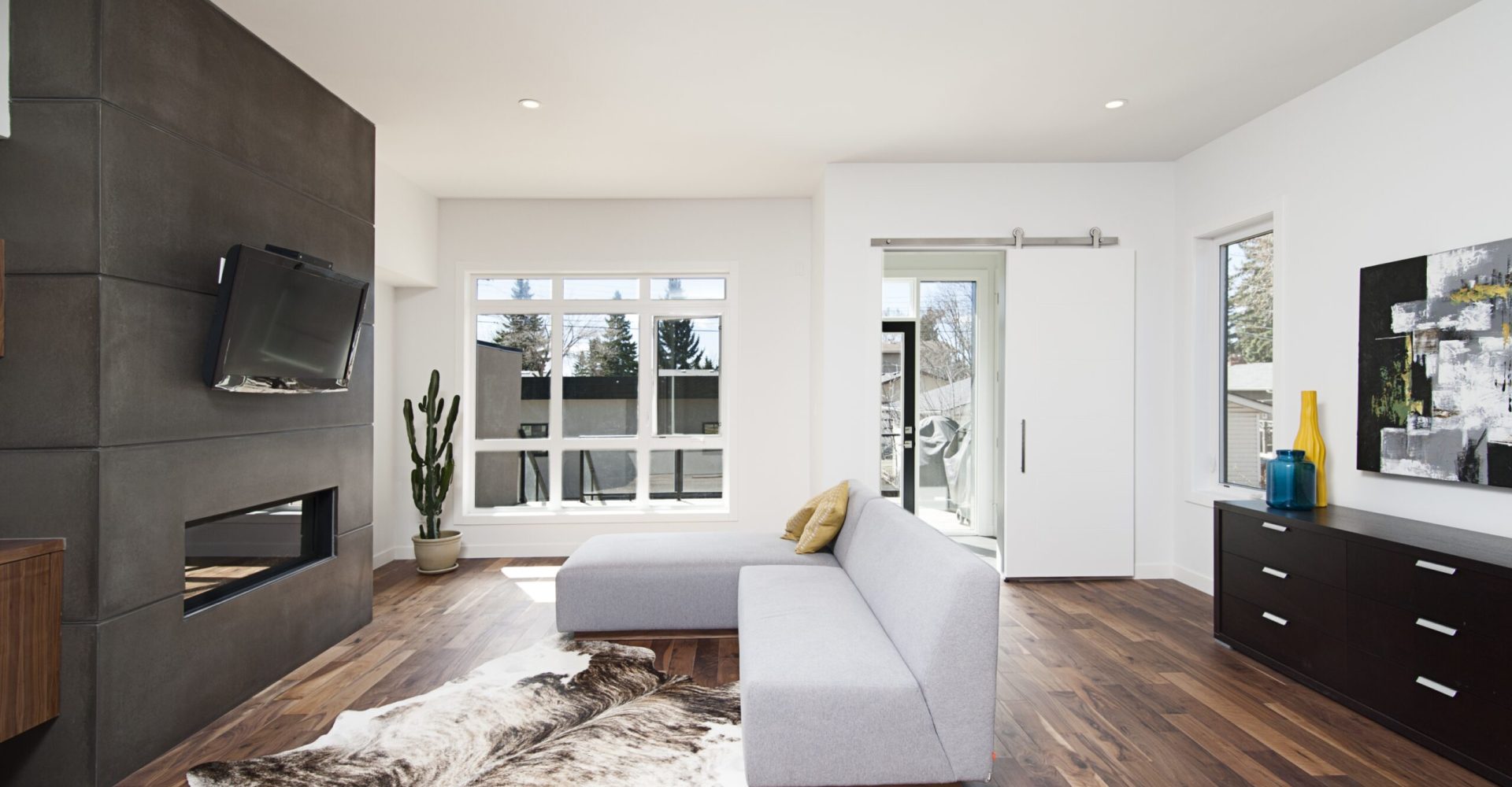 Beautiful interior shot of a modern house with white relaxing walls and furniture and technology