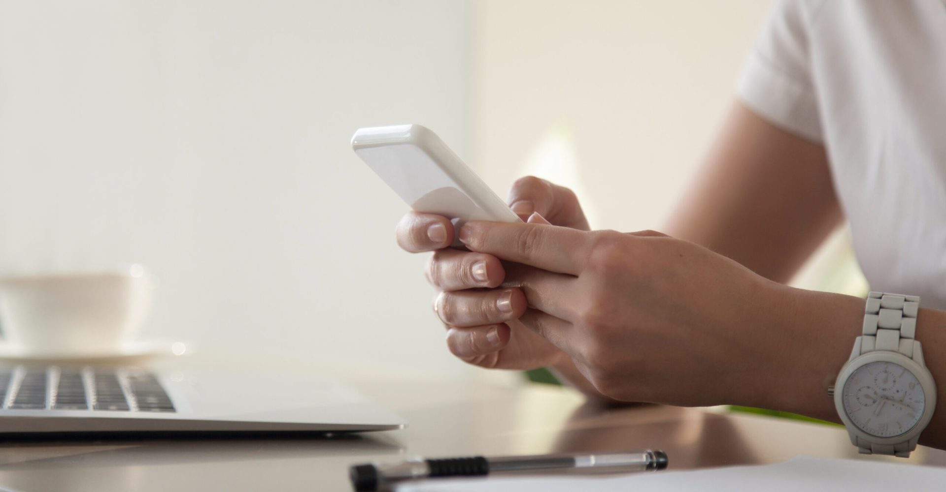 Businesswoman looking important contact on phone