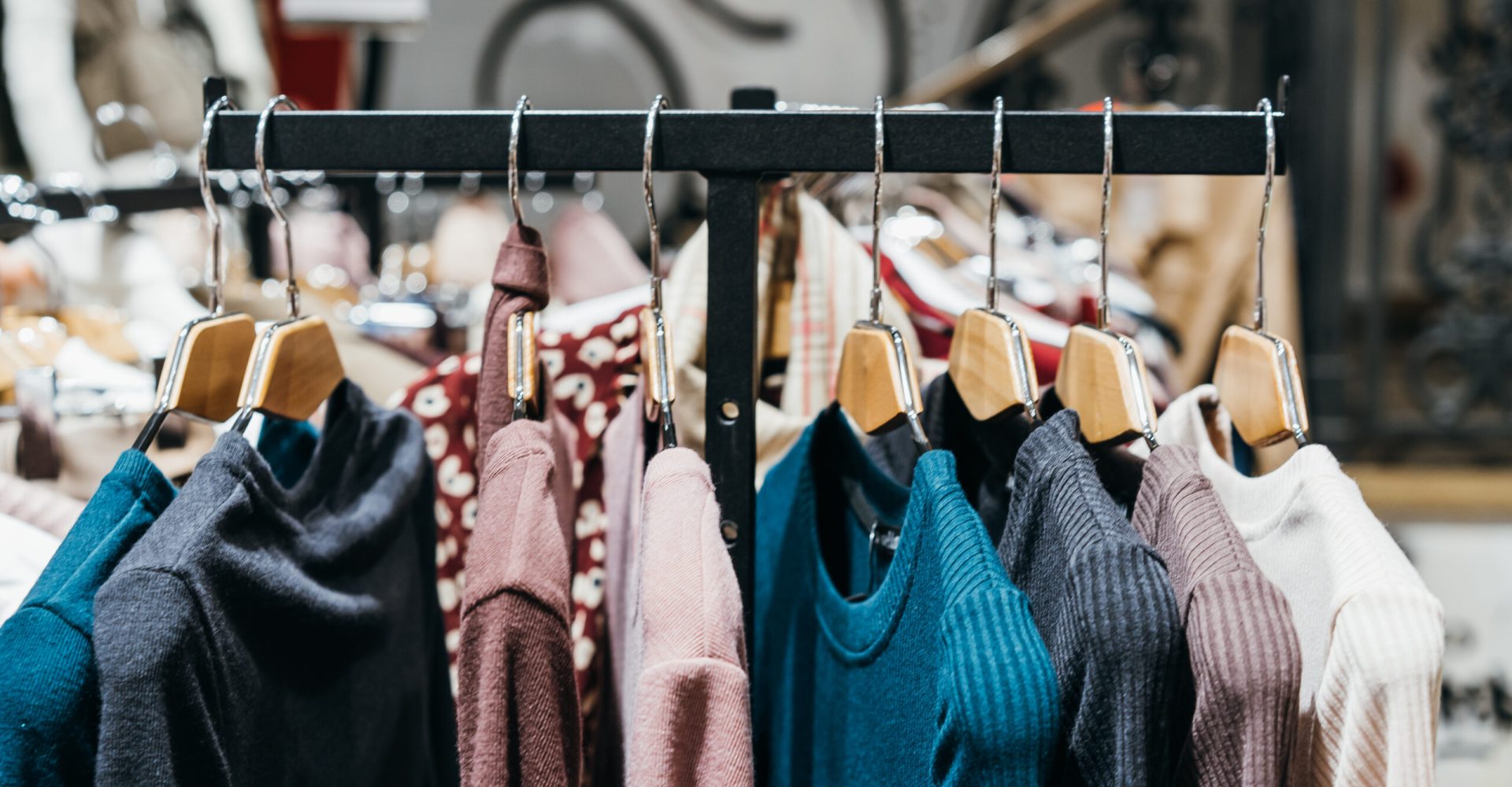 fashion clothing on hangers at the show